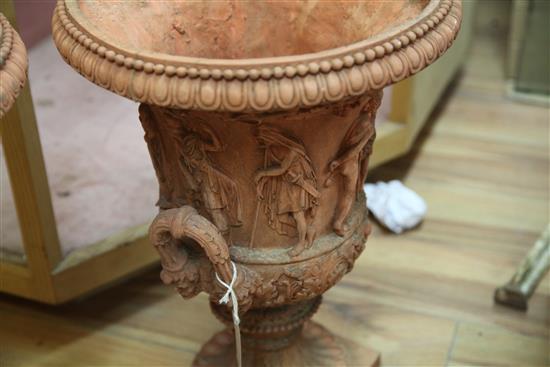 A pair of Victorian terracotta campana urns, H.1ft 8in. Diam.1ft 2in.
